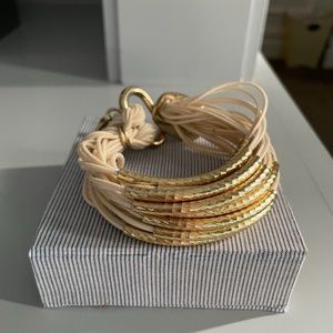 Gi Ivory leather bracelet with gold accents